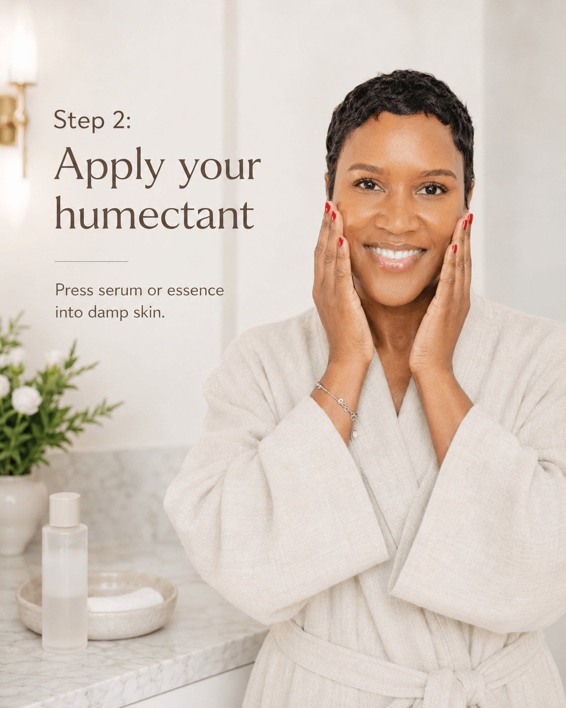 Black woman in a cream robe pressing a hydrating serum into her damp skin with both hands, with text reading "Step 2: Apply your humectant."
